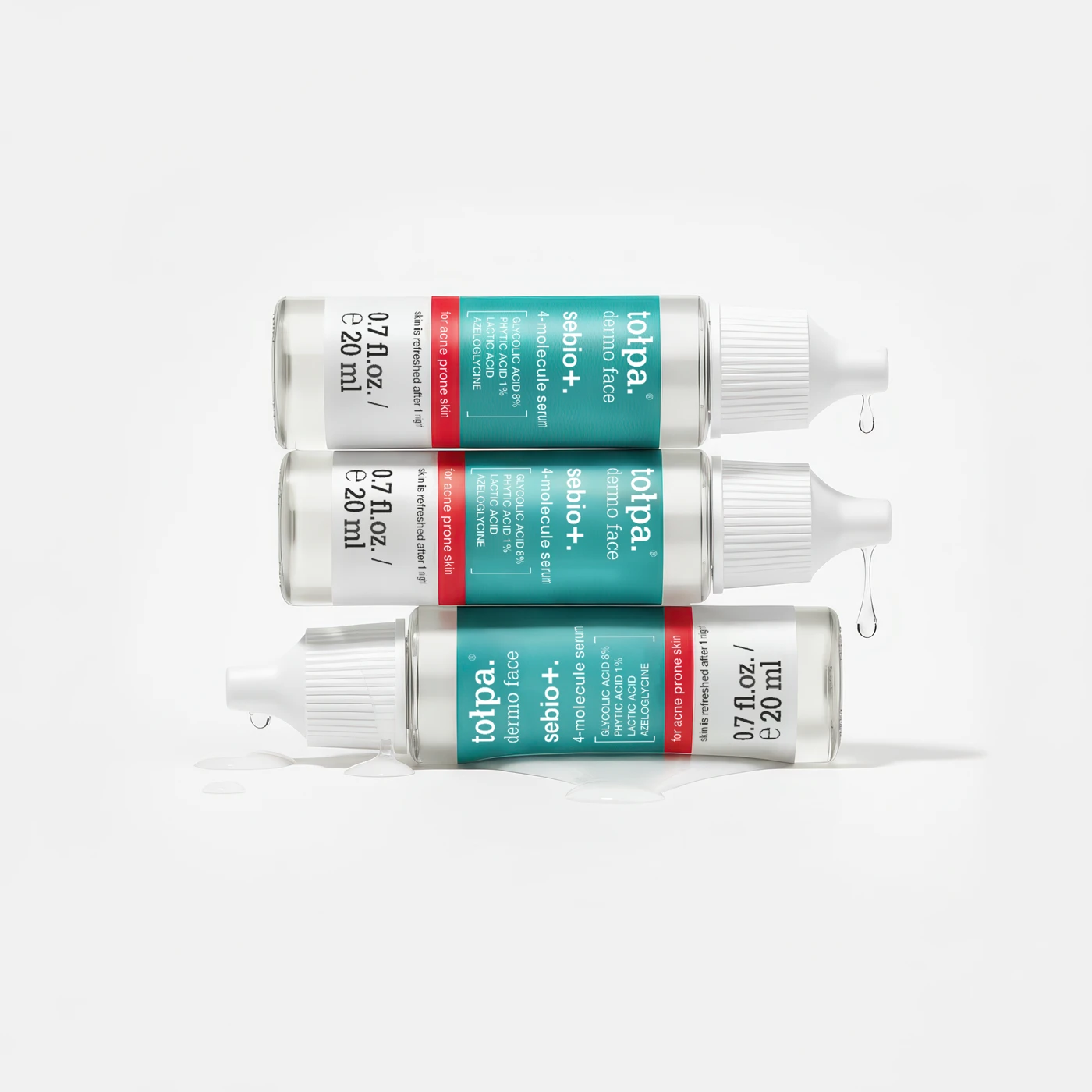 Brand photograph of three 4-Molecule Serum bottles
